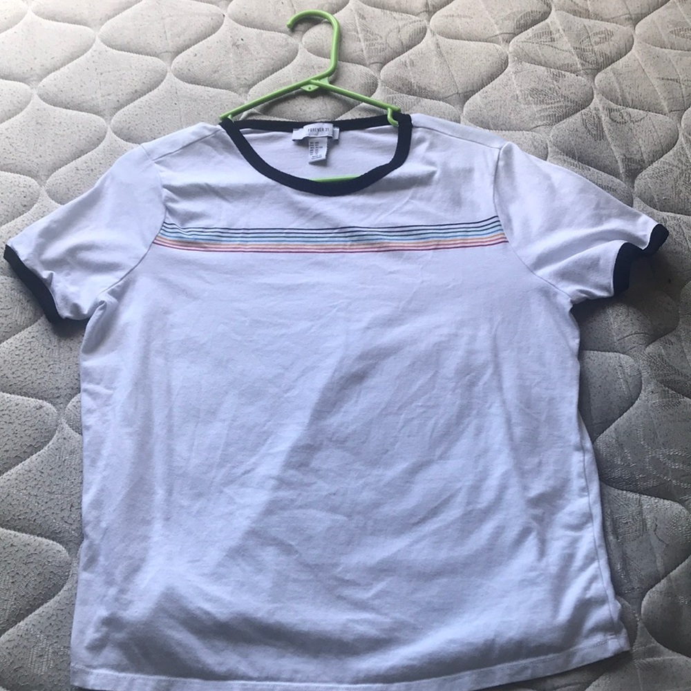 shirt that has a rainbow across it